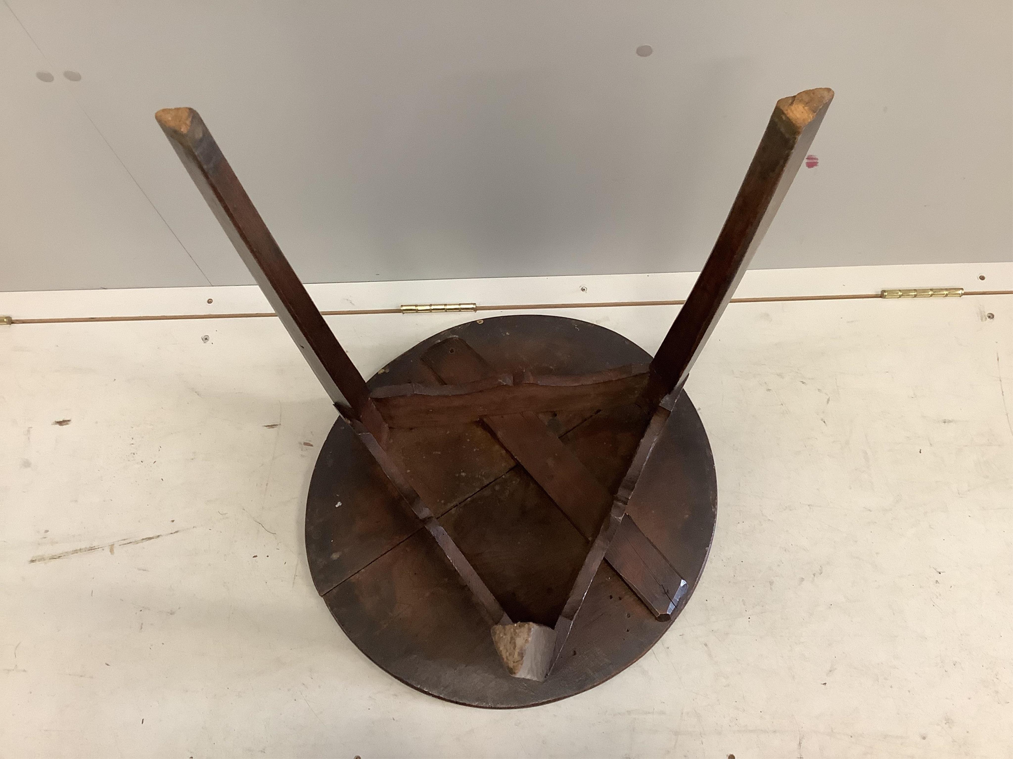 An 18th century oak and elm cricket table, width 51cm, depth 54cm, height 64cm. Condition - poor to fair